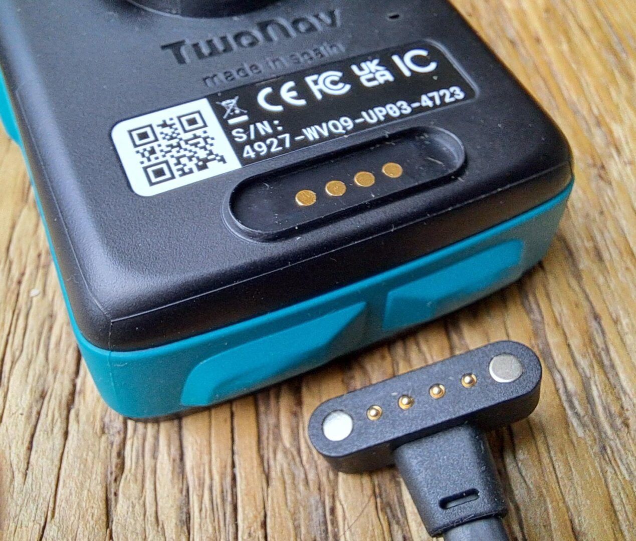 Charging is via a proprietary magnetic pogo